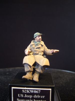 S2KW067 - The Souvenir Hunters I Seated US GI in greatcoat WWII